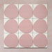 Pebble Beach Reversed Pink 20x20cm patterned tiles featuring a soft blush pink organic circular design, perfect for adding a playful yet minimalist look to bathrooms, kitchens, and statement floors.