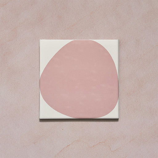Pebble Beach Reversed Pink 20x20cm patterned tiles featuring a soft blush pink organic circular design, perfect for adding a playful yet minimalist look to bathrooms, kitchens, and statement floors.