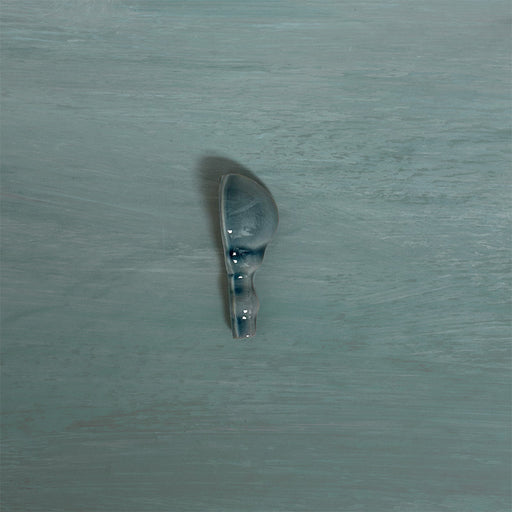 Detail view of Finchley River Blue ceramic external corner trim with a crackle glaze finish, designed to create a smooth, decorative transition and a polished edge in classic wall tile installations.