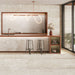 Kitchen interior featuring Contract Pebble Rock Avorio 60x120cm terrazzo effect porcelain wall and floor tiles, styled with a modern island, ribbed splashback detail, bar stools, and warm terracotta accents for a contemporary finish.