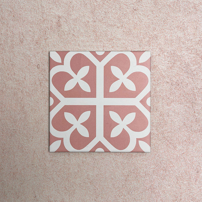 Iris Pink Victorian Moroccan-style 20x20cm patterned porcelain tile, featuring a soft pink and white decorative motif with classic geometric detailing.