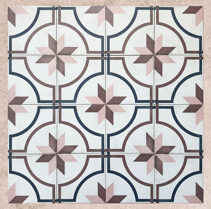 Grouped layout of Carnaby Rose Victorian-style 20x20cm porcelain wall and floor tiles, showing the full repeating pink, brown, and navy geometric star pattern on an aged white background.