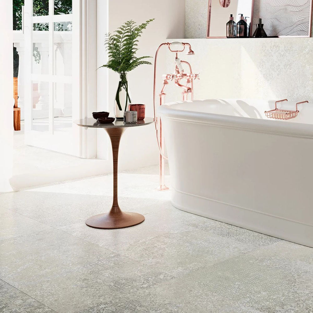 Bathroom interior featuring Boheme Sahara 60 × 60cm patterned tiles, blending soft neutral tones with a lightly worn, decorative effect. Ideal for creating calm, characterful floors in bathrooms, kitchens, or relaxed living spaces.