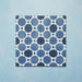 Four-tile layout of Carnaby Sapphire Victorian-style 20x20cm porcelain wall and floor tiles, highlighting the repeating blue geometric octagon pattern with white connecting lines and small charcoal accents.