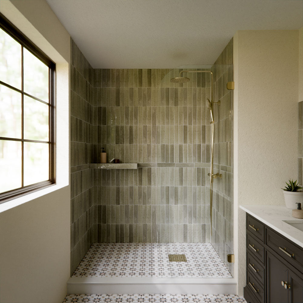 Walk-in shower featuring Agraba Natural 20×20cm Moroccan-style patterned tiles in soft neutral tones, used on the floor to add subtle pattern and warmth to a calm, spa-inspired bathroom space.
