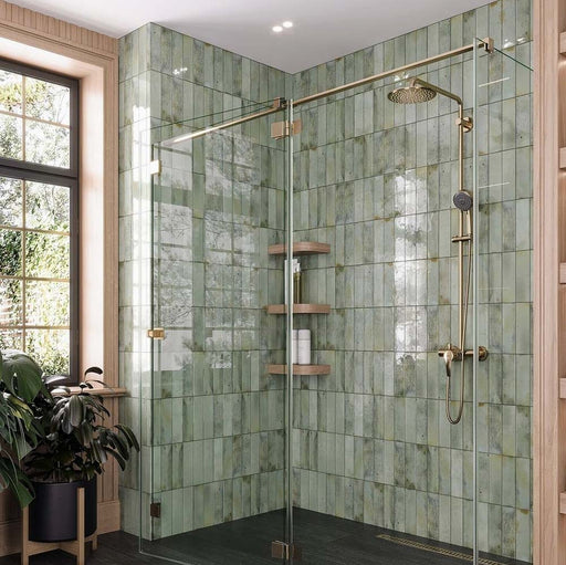 Bathroom featuring Beijing Celadon Green Brick 5.1x16.1cm Moroccan-style ceramic wall tiles, styled with gold shower fittings, glass enclosure and natural wood accents.