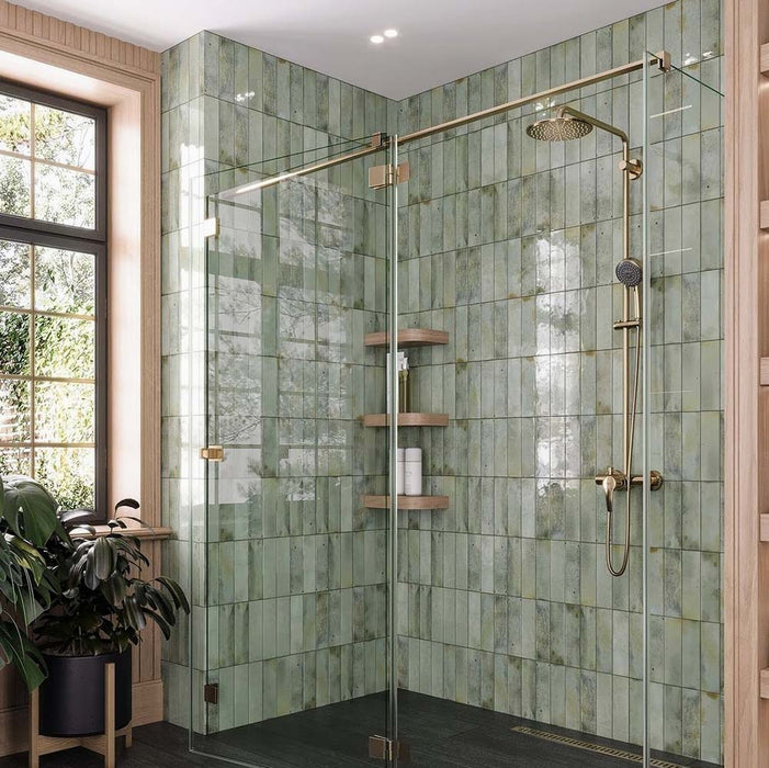 Bathroom featuring Beijing Celadon Green Brick 5.1x16.1cm Moroccan-style ceramic wall tiles, styled with gold shower fittings, glass enclosure and natural wood accents.
