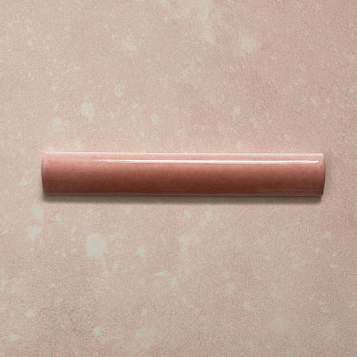Zellij Rose Pink bullnose trim, 3cm x 20cm, Moroccan style glazed ceramic, featuring warm rose pink tones, subtle tonal variation, glossy finish, and gently rounded edges for a handcrafted decorative edge detail.