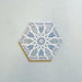 Maroush Mareshan Azure Blue 18.7x21.6cm Moroccan hexagonal tile featuring an intricate white starburst pattern on a soft blue background, inspired by traditional Moroccan craftsmanship.