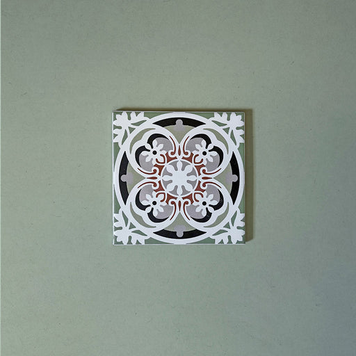 Empire Green 15x15cm Victorian single floor tile featuring a classic floral and scroll motif in sage green, terracotta, and white tones with a heritage-inspired geometric border design.