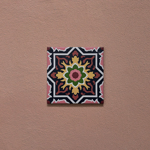 Cabana Havana Mini 15x15cm Moroccan-style ceramic tile shown as a single piece, featuring a multicolour floral geometric pattern on a terracotta background.