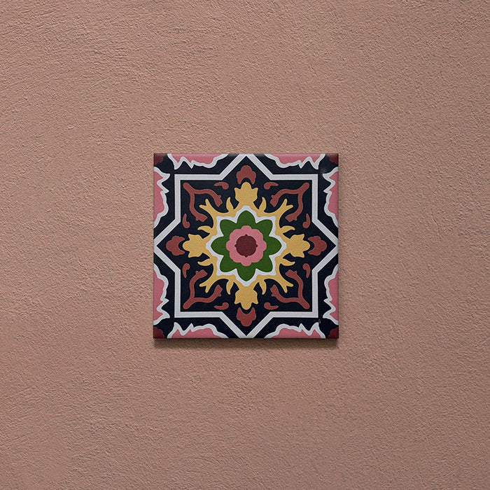 Cabana Havana Mini 15x15cm Moroccan-style ceramic tile shown as a single piece, featuring a multicolour floral geometric pattern on a terracotta background.