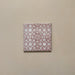Bedouin Tetuan Rose Moroccan-style 15x15cm single tile featuring an intricate geometric pattern in blush pink and soft white tones, displayed on a warm neutral background to highlight its handcrafted matte finish and subtle texture.