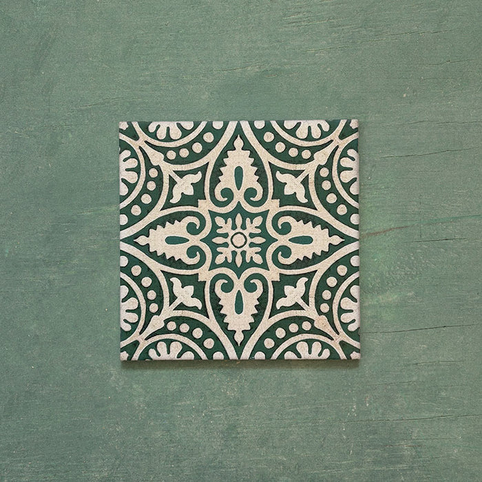 Cabana Flowers Moroccan Style 20x20cm single porcelain tile featuring an intricate floral and leaf motif in deep green and off-white with a vintage encaustic effect and smooth matt finish