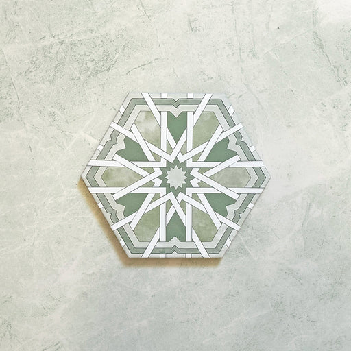 Maroush Mareshan Verde Green 18.7x21.6cm Moroccan hexagonal tile featuring a detailed white geometric star motif on a soft green background, inspired by classic Moroccan design.