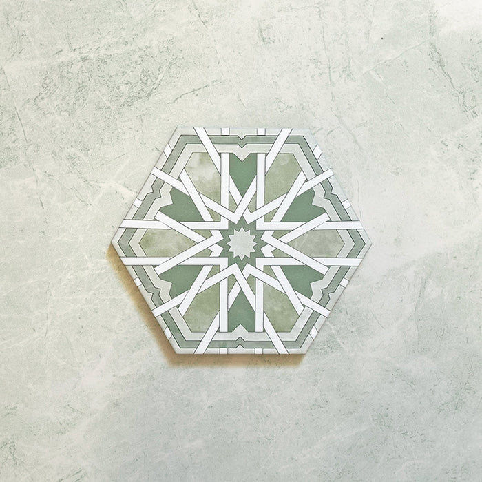 Maroush Mareshan Verde Green 18.7x21.6cm Moroccan hexagonal tile featuring a detailed white geometric star motif on a soft green background, inspired by classic Moroccan design.