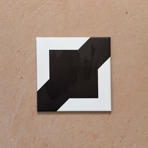 Alhambra Cathedral 20x20cm Moroccan tile single tile image showing a bold geometric black and white design with intersecting square and diagonal shapes — perfect for statement floors and feature walls.