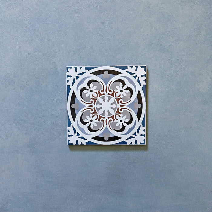 Empire Blue 15x15cm Victorian ceramic tile single piece, featuring an ornate floral and scroll design in deep blue, white, grey, and terracotta tones with a classic heritage look.