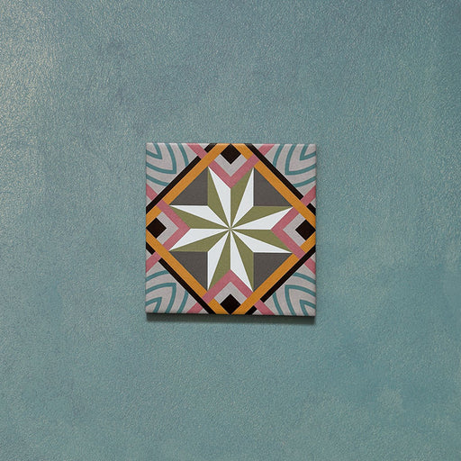 Cabana Star Mini 15x15cm Moroccan-style ceramic tile shown as a single piece, featuring a multicolour geometric star pattern on a teal background.