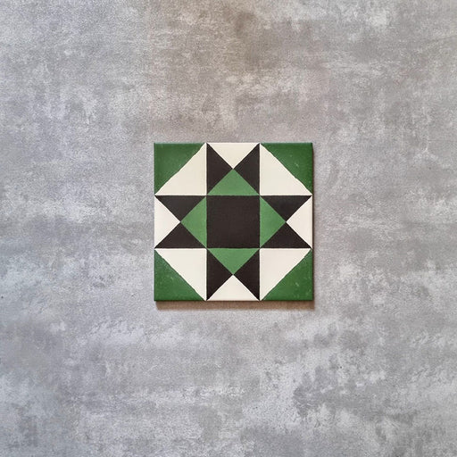 Maison Green Decor Victorian Pattern 20cm x 20cm, single patterned tile featuring a geometric Victorian star design, deep green, black and white colour palette, matt finish, bold heritage-inspired decorative floor tile.