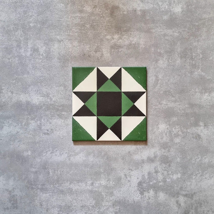 Maison Green Decor Victorian Pattern 20cm x 20cm, single patterned tile featuring a geometric Victorian star design, deep green, black and white colour palette, matt finish, bold heritage-inspired decorative floor tile.