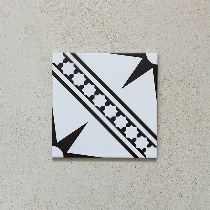 Galata White Moroccan style 20x20cm patterned tile, shown as a single tile highlighting the white and black geometric star design.