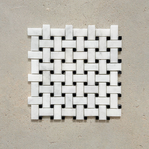 Single Fitzrovia Black & White Basketweave Mosaic 32.5x32.5cm honed natural marble tile sheet displayed on a neutral surface, showcasing a classic woven pattern with white marble pieces and contrasting black accents.