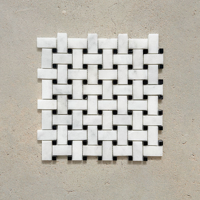 Single Fitzrovia Black & White Basketweave Mosaic 32.5x32.5cm honed natural marble tile sheet displayed on a neutral surface, showcasing a classic woven pattern with white marble pieces and contrasting black accents.