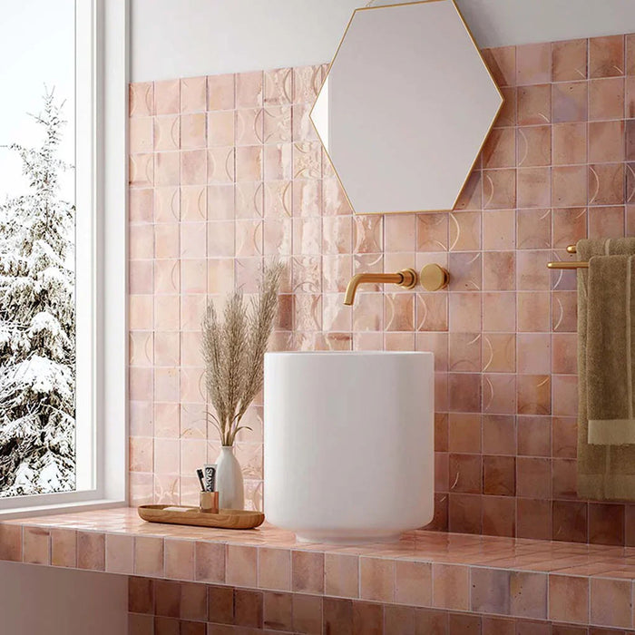 Sink area featuring Beijing Rose Pink Decor Square 10x10cm Moroccan-style wall tiles, styled with gold accents, a hexagonal mirror, and a soft blush-toned backdrop for a warm, elegant finish.