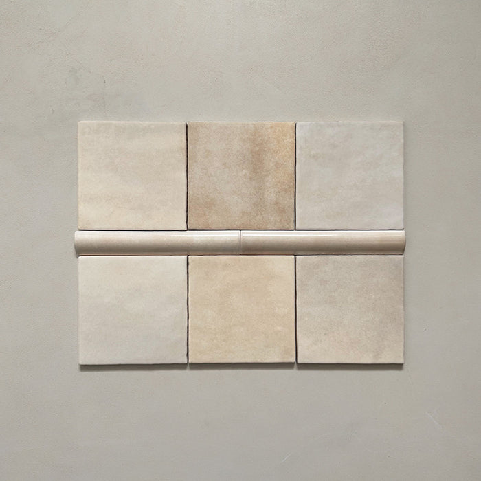 Zellij Bone bullnose tile in a 3cm x 20cm format, Moroccan style, featuring soft bone-beige tones, a glossy finish, and gentle handmade surface variation.