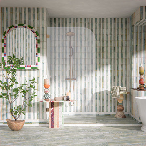 Bathroom setting featuring Beijing White and Celadon Green 5.1x16.1cm Moroccan style brick wall tiles, arranged in a vertical striped layout with soft tonal variation, paired with natural stone flooring and organic textures for a calm, spa-inspired finish.