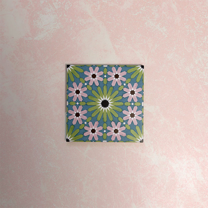 Fizaan Summer Mini Moroccan-style 15×15cm porcelain tile featuring a blue, green and pink geometric floral pattern.