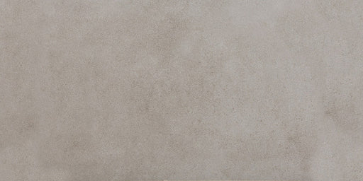 Close-up of Tane Stone Grey Matt 30 × 60cm porcelain tile, showcasing a soft mid-grey tone with subtle surface variation and a smooth matt finish for a clean, contemporary look.
