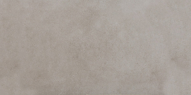 Close-up of Tane Stone Grey Matt 30 × 60cm porcelain tile, showcasing a soft mid-grey tone with subtle surface variation and a smooth matt finish for a clean, contemporary look.