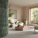 Living room featuring Tane Stone Pearl Matt 30 × 60cm porcelain floor tiles, styled with soft neutral furnishings, indoor plants, and warm natural light for a calm, contemporary, design-led space.