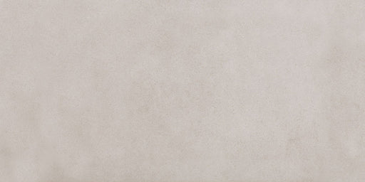 Close-up of Tane Stone Pearl Matt 30 × 60cm porcelain tile, showcasing a soft light grey tone with subtle surface variation and a smooth matt finish for a clean, contemporary look.