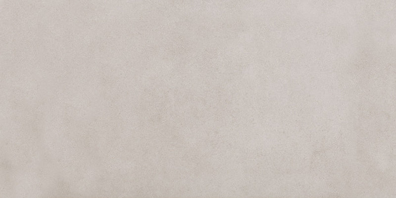 Close-up of Tane Stone Pearl Matt 30 × 60cm porcelain tile, showcasing a soft light grey tone with subtle surface variation and a smooth matt finish for a clean, contemporary look.