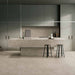 Kitchen interior featuring Tane Stone Pearl Matt 60 × 60cm porcelain floor tiles, styled with a minimalist island, sleek cabinetry, and soft neutral tones for a clean, contemporary, design-led space.