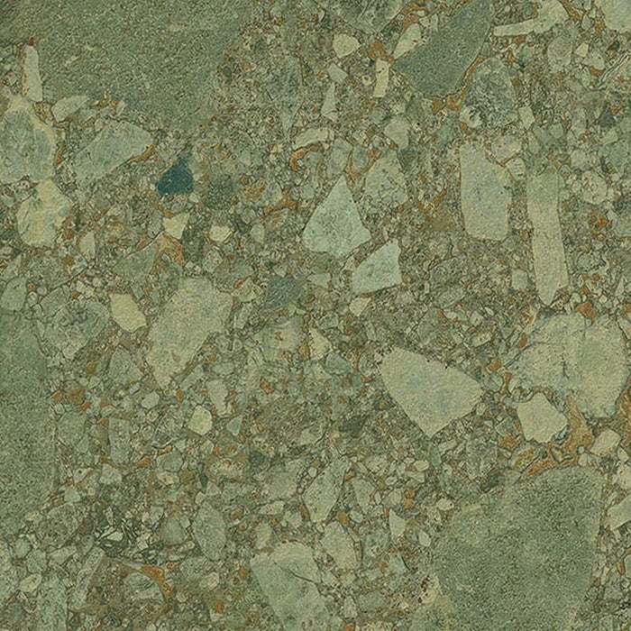 Close-up of Terrace Terrazzo Green 60x60cm porcelain tile featuring a terrazzo effect in soft sage green tones. The design combines large and small stone fragments with subtle warm brown flecks, creating a natural, contemporary surface with depth and texture for walls and floors.