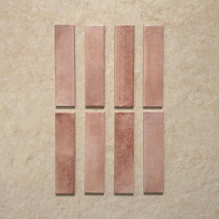 Izmir Brick Tusk Rose Gloss 6x25cm — individual tile set. Each piece showcases delicate tonal variation and a soft pinkish blush hue, enhanced by a glossy, handcrafted surface. Ideal for adding warmth and personality to kitchens, bathrooms, and feature walls.