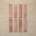 Izmir Brick Tusk Rose Gloss 6x25cm — individual tile set. Each piece showcases delicate tonal variation and a soft pinkish blush hue, enhanced by a glossy, handcrafted surface. Ideal for adding warmth and personality to kitchens, bathrooms, and feature walls.
