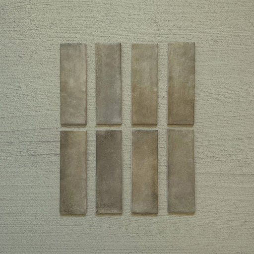 Zellij Weald Green Brick Moroccan Style 6.5cm x 20cm, slim brick-format tiles with soft weald green and earthy khaki undertones, subtle tonal variation, gently textured glazed finish, and handcrafted Moroccan-inspired design.