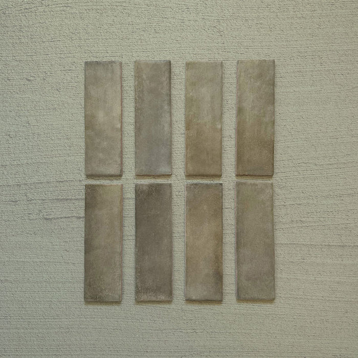 Zellij Weald Green Brick Moroccan Style 6.5cm x 20cm, slim brick-format tiles with soft weald green and earthy khaki undertones, subtle tonal variation, gently textured glazed finish, and handcrafted Moroccan-inspired design.