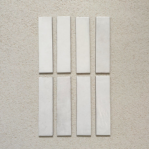 Madison White Brick Wall Tiles 6x24.6cm — featuring a handcrafted look with gentle texture and a soft white glaze. These elongated tiles offer timeless versatility, perfect for herringbone, stacked, or brick-bond layouts in kitchens and bathrooms.