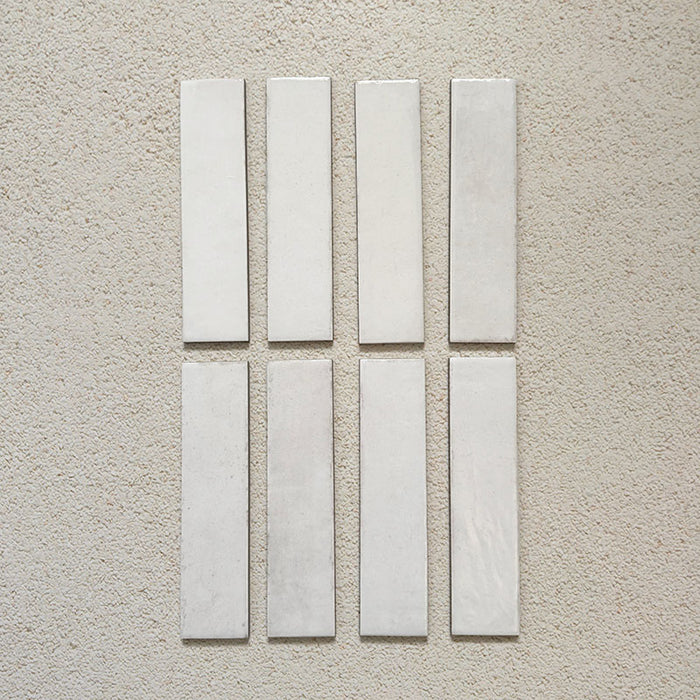 Madison White Brick Wall Tiles 6x24.6cm — featuring a handcrafted look with gentle texture and a soft white glaze. These elongated tiles offer timeless versatility, perfect for herringbone, stacked, or brick-bond layouts in kitchens and bathrooms.