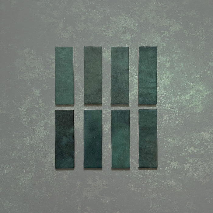 Zellij Gloss Green brick Moroccan-style tiles, 6.5cm x 20cm, rich deep green colour with natural tonal variation, glossy glazed finish, slim rectangular format, handcrafted Moroccan design.