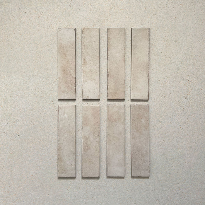 Madison Oatmeal Brick Wall Tiles 6x24.6cm — featuring a natural blend of beige and cream tones with a softly textured surface. Each tile has a handcrafted look, bringing warmth and understated elegance to any interior design.