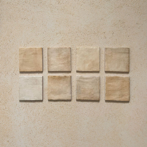 Zellij Arena Square Moroccan Style 10cm x 10cm tiles, square Moroccan tiles in warm sandy beige and soft cream tones, subtle tonal variation with a gently rippled glazed finish, handmade-style surface with natural texture, ideal for characterful bathroom and kitchen walls.
