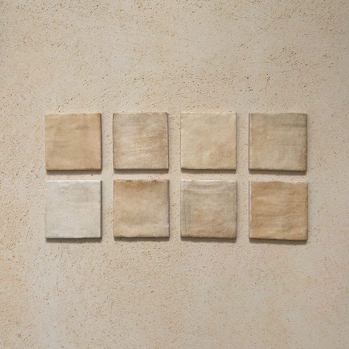 Zellij Arena Square Moroccan Style 10cm x 10cm tiles, square Moroccan tiles in warm sandy beige and soft cream tones, subtle tonal variation with a gently rippled glazed finish, handmade-style surface with natural texture, ideal for characterful bathroom and kitchen walls.