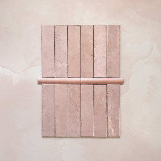 Madison Rose Bullnose Pencil Border Tiles 3x20cm — shown here with the matching Madison Rose brick tiles. The soft blush tone and smooth curved profile create a perfect finishing touch for edges and transitions, adding subtle elegance to any tiled space.